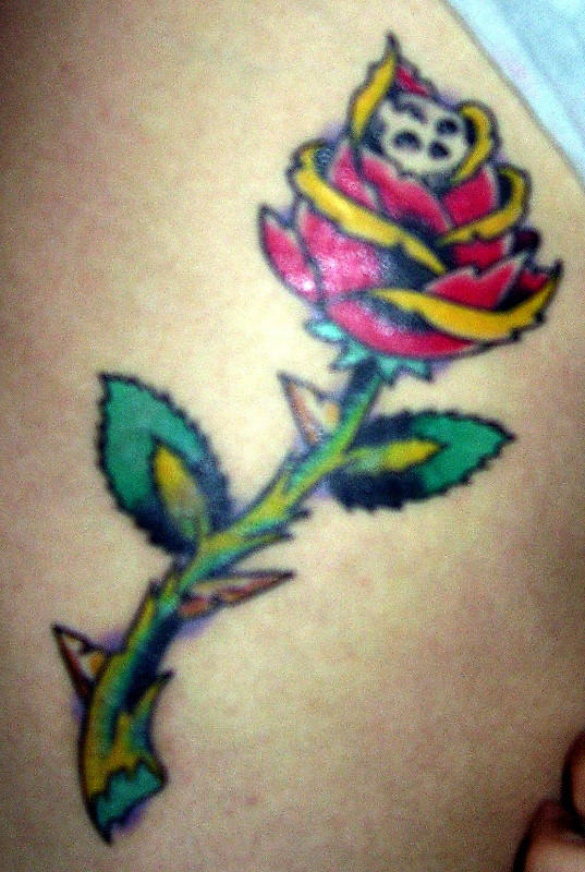 rose tattoo on elbow. rose tattoo on elbow. rose
