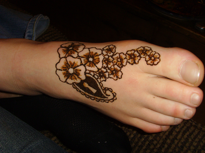 Flower and paisley on foot | Flower Tattoo