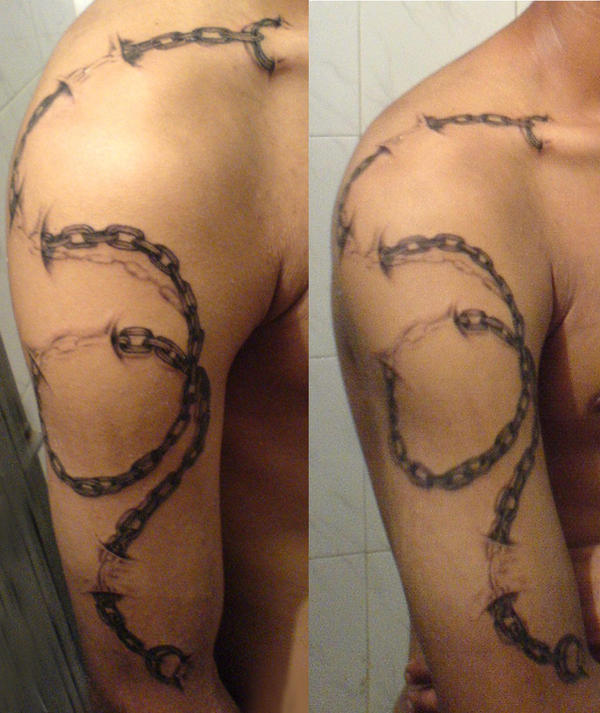 chain tattoo - chest tattoo