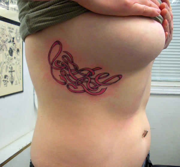 arm tattoos - lotus flower tattoo design. arm cancer ribbon tattoo
