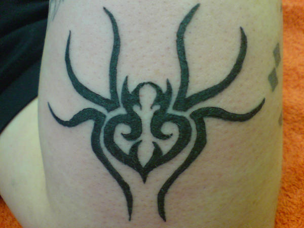 tribal spider tattoo. Tribal spider tattoo 2009