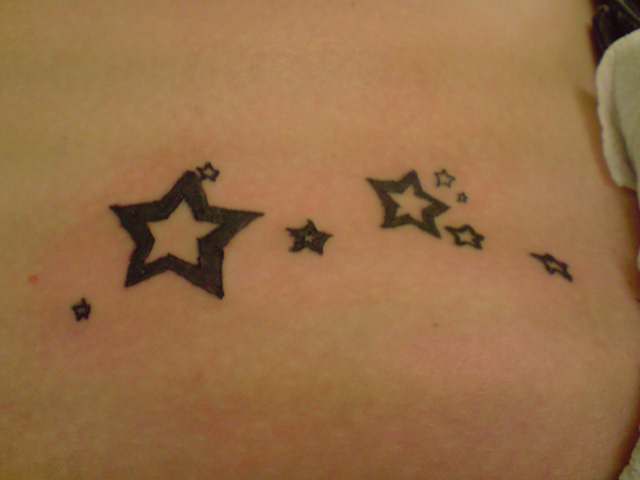 hip tattoo gallery. hip tattoo. Stars on the hip