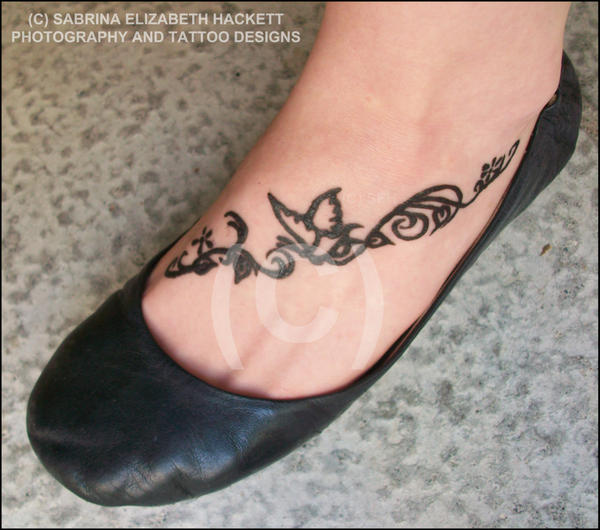 Butterfly and Vine Foot Tattoo | Flower Tattoo