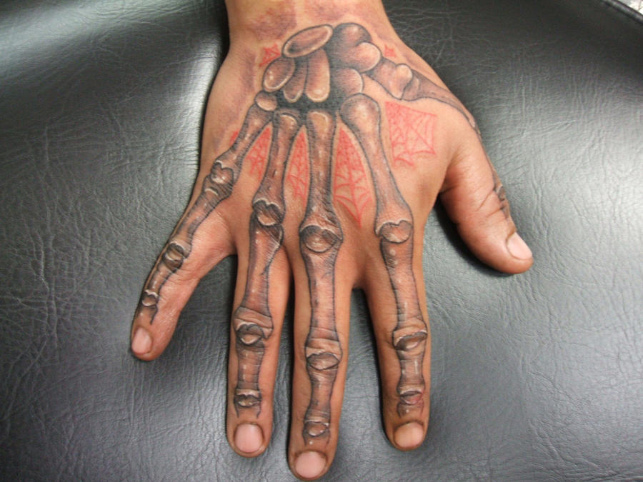 Skeleton Hand tattoo by BodyGraffixTattoo