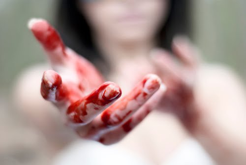 hands in blood