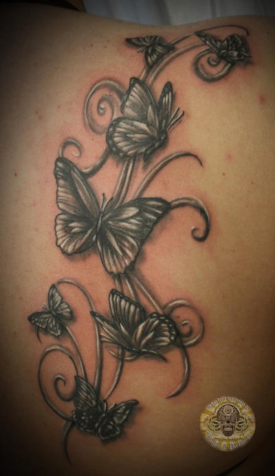 woman tattoo woman tattoo Butterflies swirls tatttoo woman tattoo
