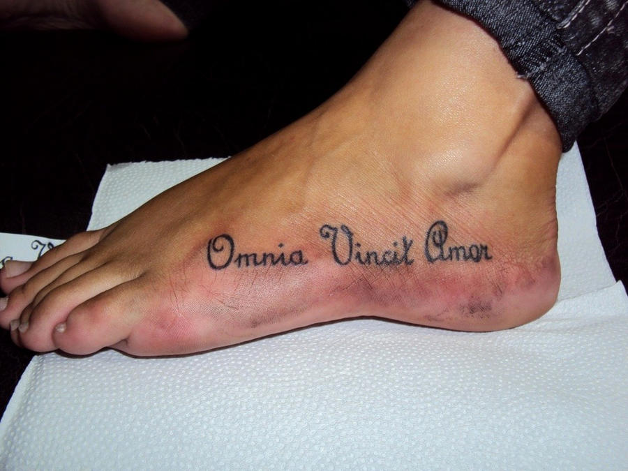 Love Conquers All In Latin Tattoo 2